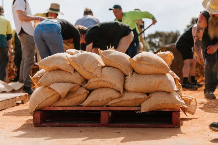 Close-up photo of a stack of recently prepared sandbags. 