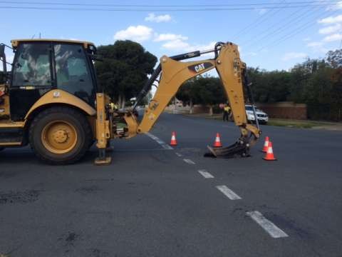Back hoe on Orr Street