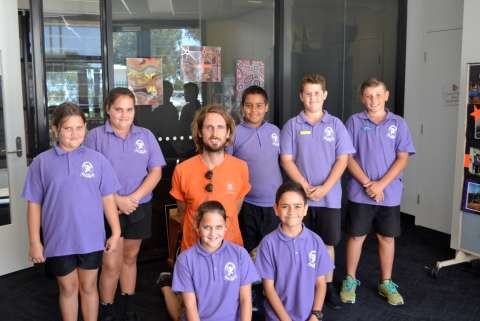 Wilmot Road Year 5/6 students who are descendants of Sir Douglas Nicholls, William Cooper, Nora Charles and Margaret Tucker with mural artist, Matt Adnate.